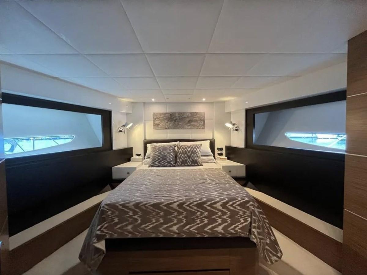 a room with a bed and a tv aboard BYSCAINE Yacht for Sale