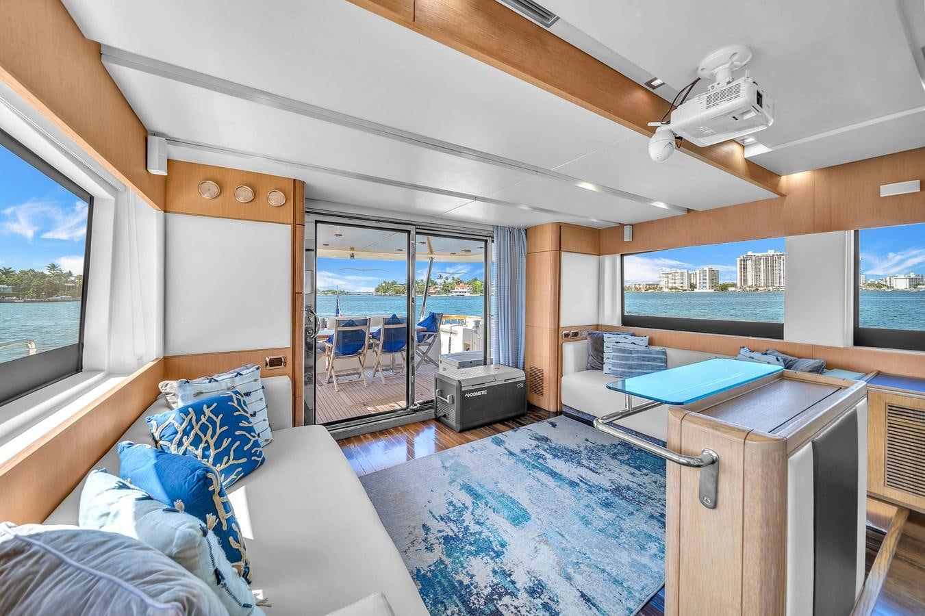 a bedroom with a bed and a desk aboard AICON 85 Yacht for Sale