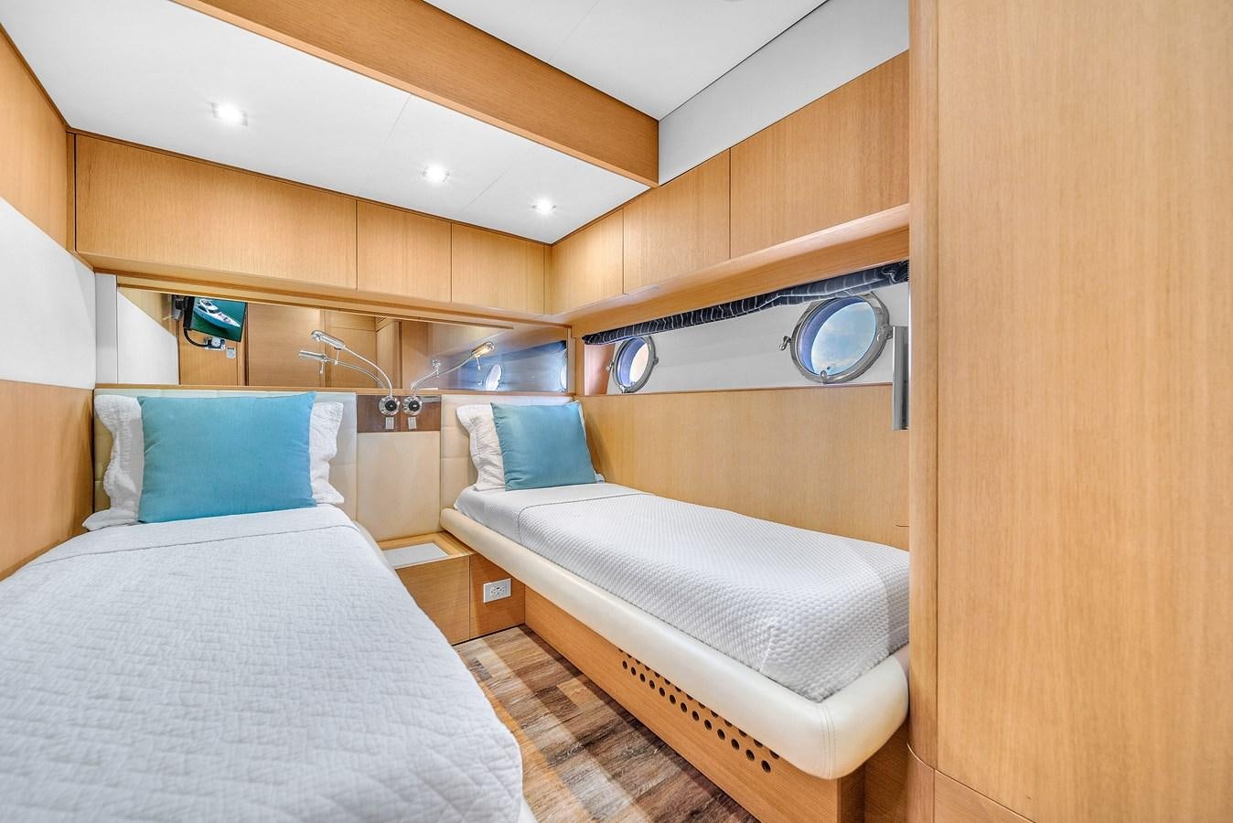 a room with two beds aboard AICON 85 Yacht for Sale