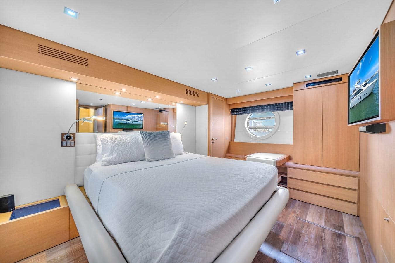 a room with a bed and a tv on the wall aboard AICON 85 Yacht for Sale