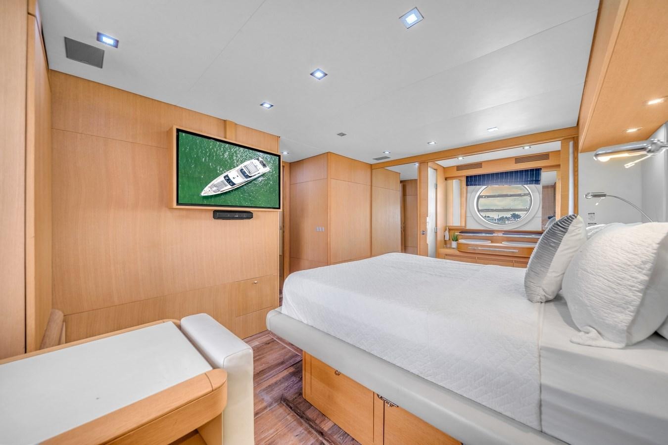 a room with a bed and a green screen aboard AICON 85 Yacht for Sale