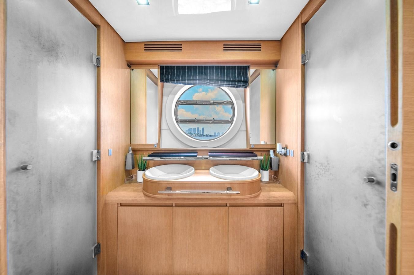 a bathroom with a wood cabinet aboard AICON 85 Yacht for Sale