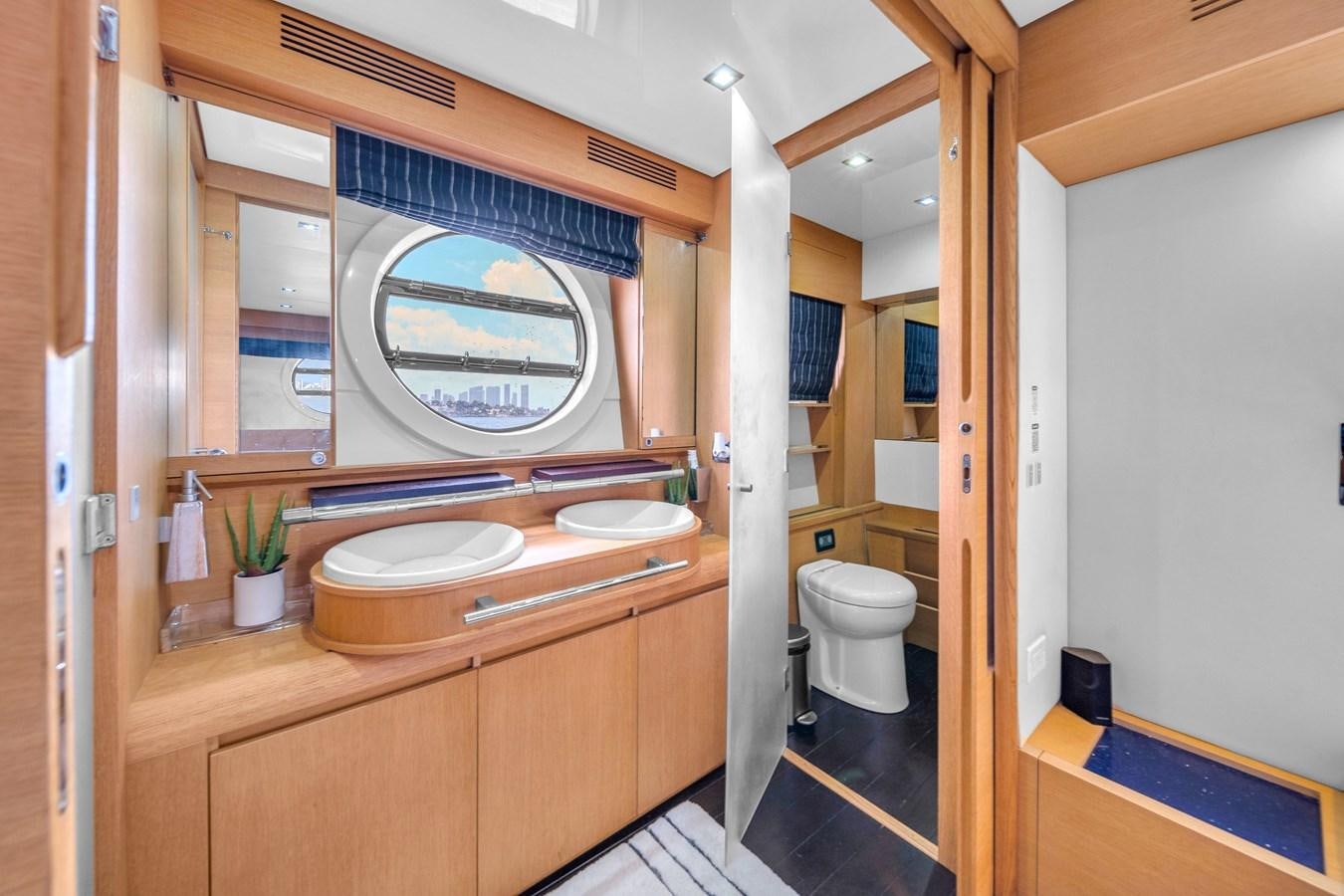 a bathroom with a large window aboard AICON 85 Yacht for Sale