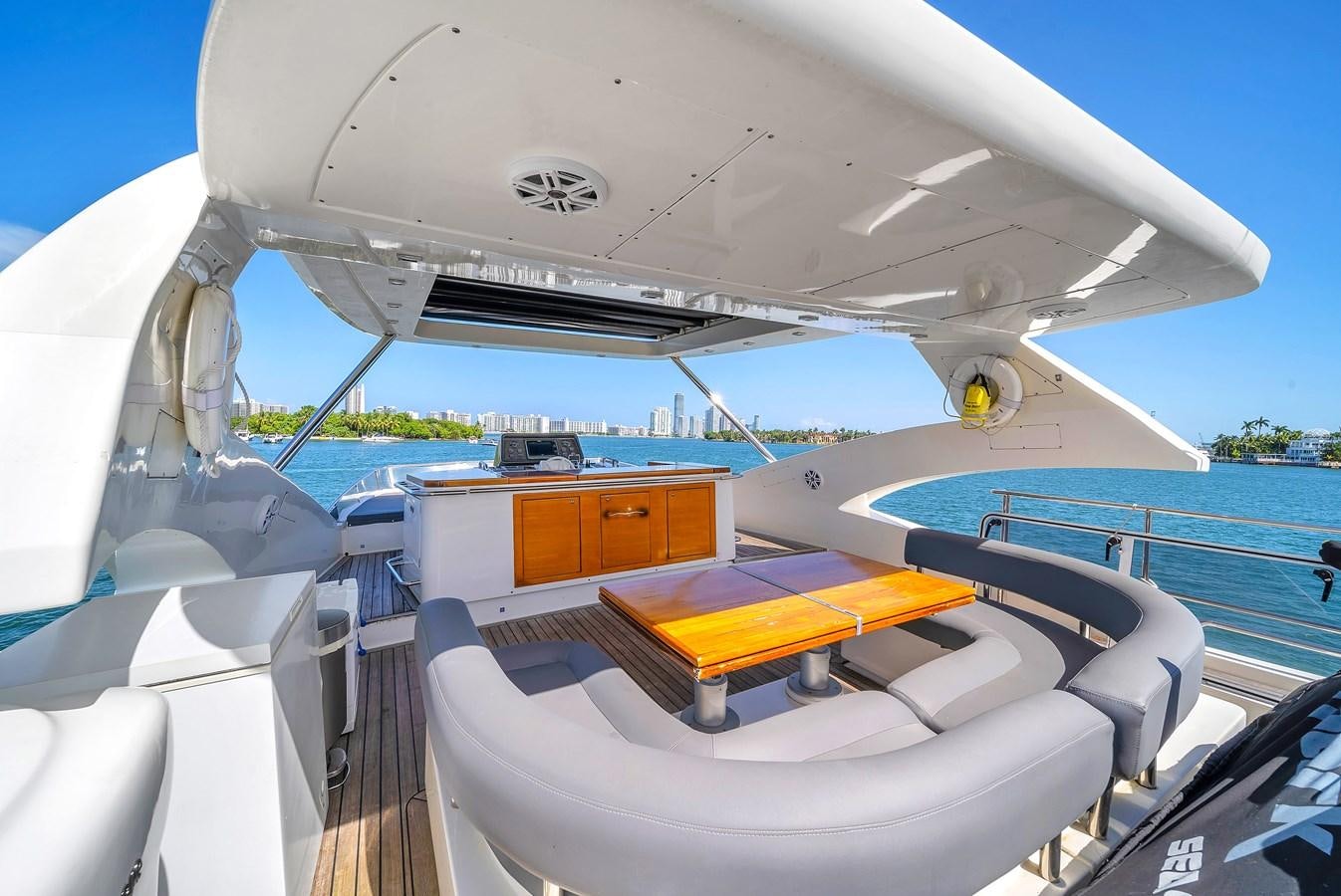 a white plane with a yellow stripe aboard AICON 85 Yacht for Sale