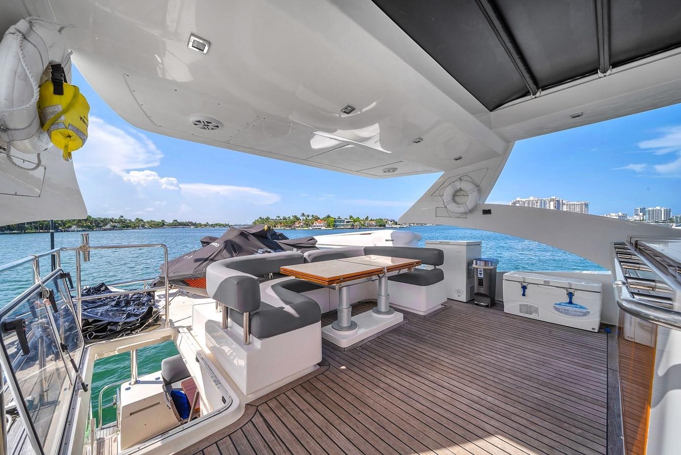 a deck with a pool and a deck with a view of the water aboard AICON 85 Yacht for Sale