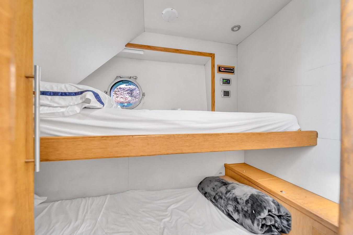 a mirror on a bed aboard AICON 85 Yacht for Sale