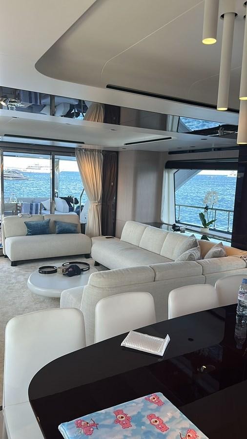 a living room with a couch and a table aboard BETTY Yacht for Sale