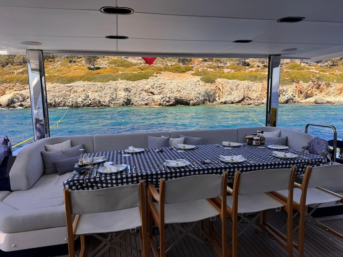 a table set for a meal aboard BETTY Yacht for Sale