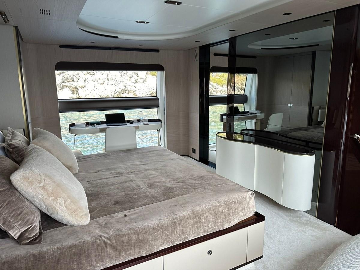 a bed in a room aboard BETTY Yacht for Sale