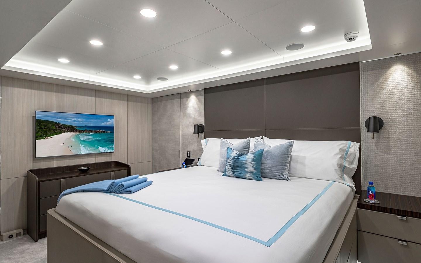 a bed in a room aboard REVERIE Yacht for Sale