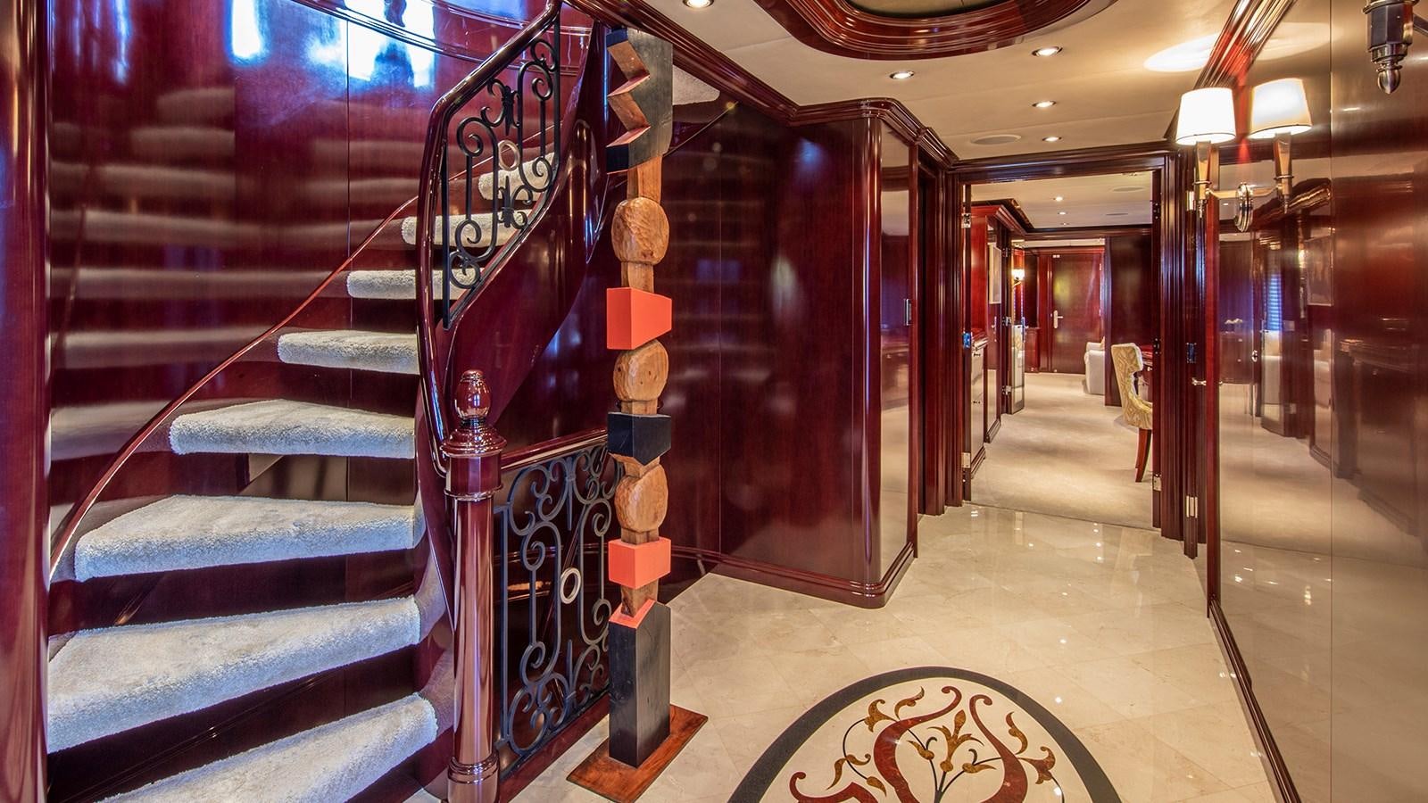 a row of metal stairs in a building aboard LA DEA II Yacht for Sale