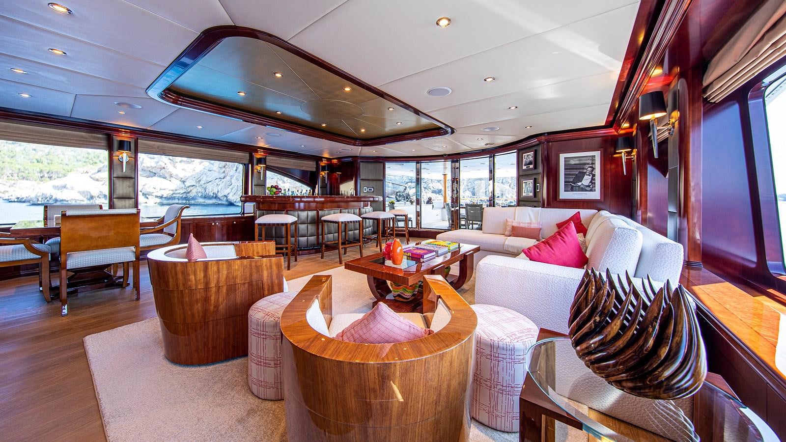 a living room with a large window aboard LA DEA II Yacht for Sale