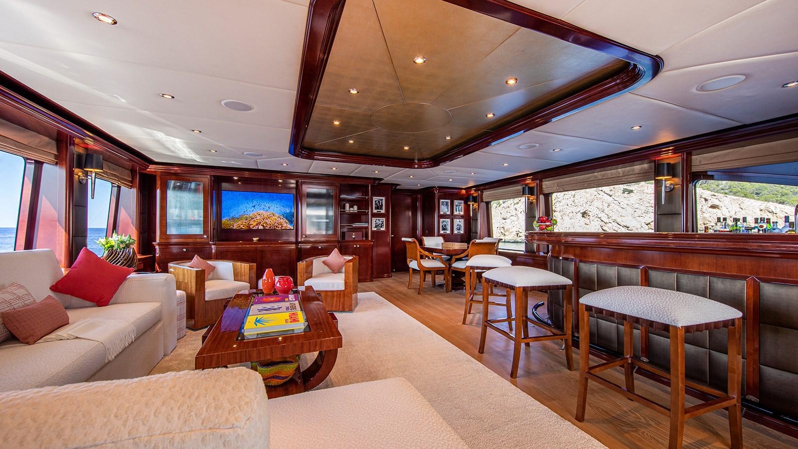 a living room with a large window aboard LA DEA II Yacht for Sale
