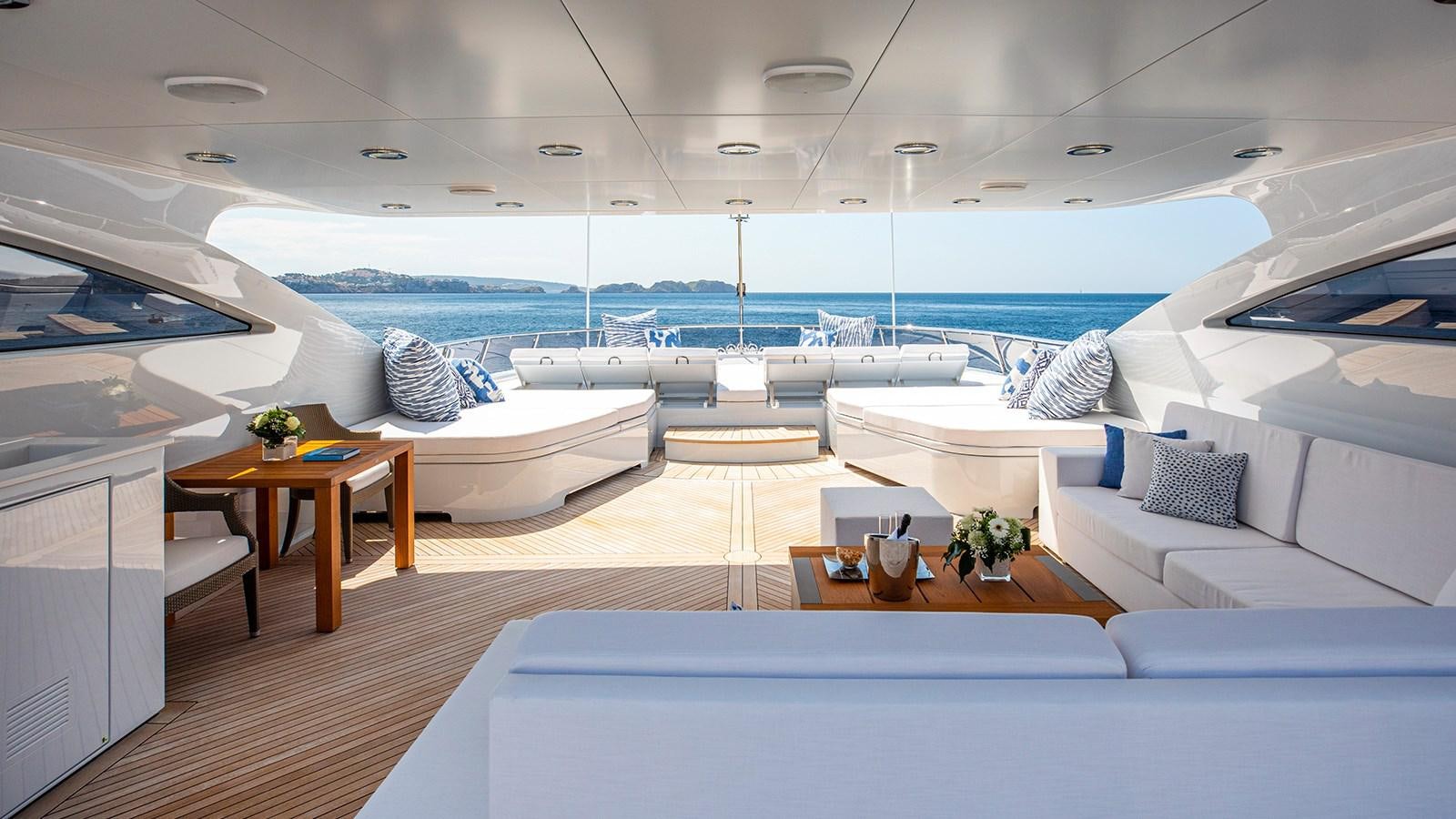 a room with a view of the ocean and the ocean aboard LA DEA II Yacht for Sale