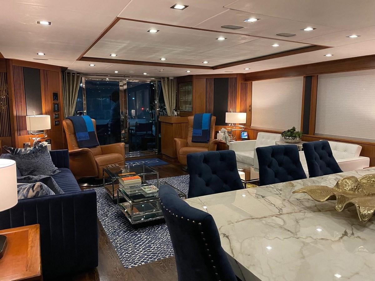 a living room with a large window aboard SOLARIS Yacht for Sale