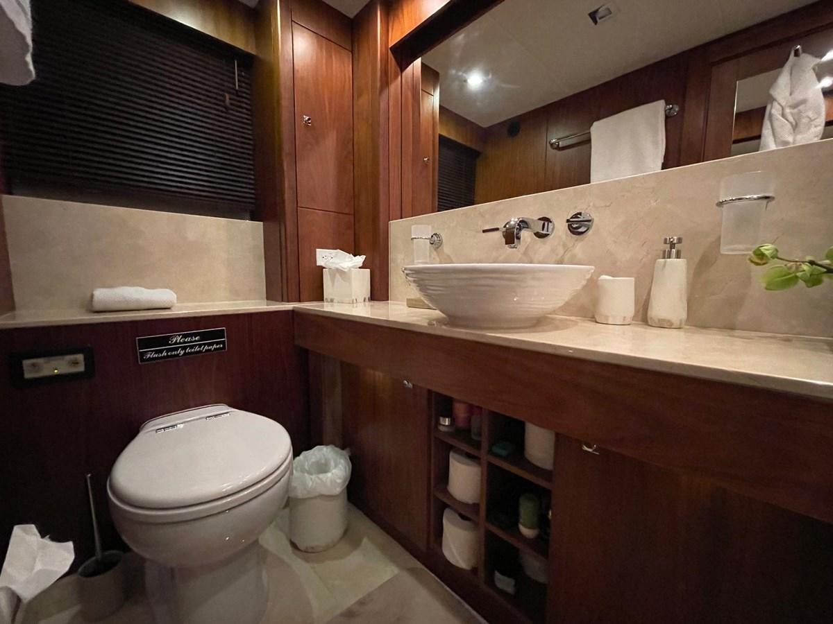 a bathroom with a sink and toilet aboard SOLARIS Yacht for Sale