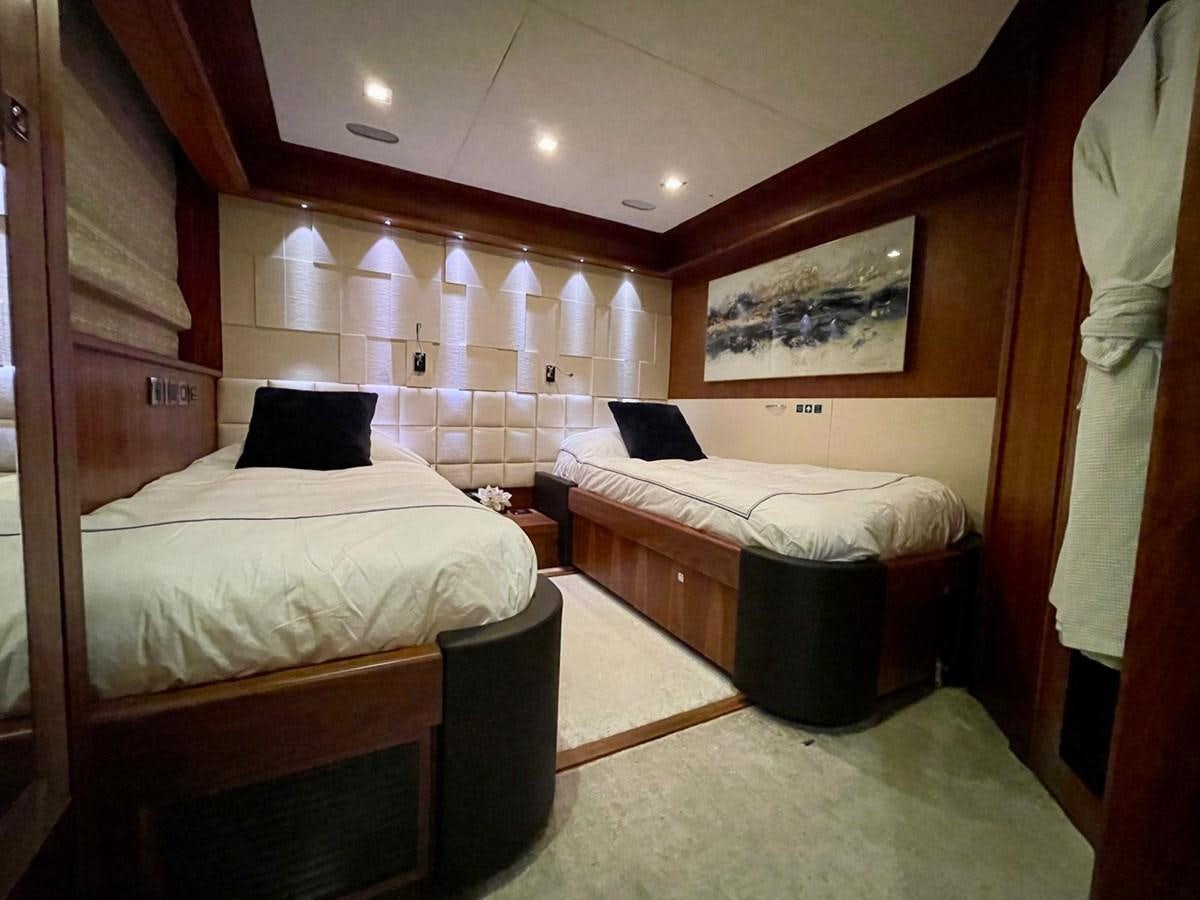 a room with two beds aboard SOLARIS Yacht for Sale