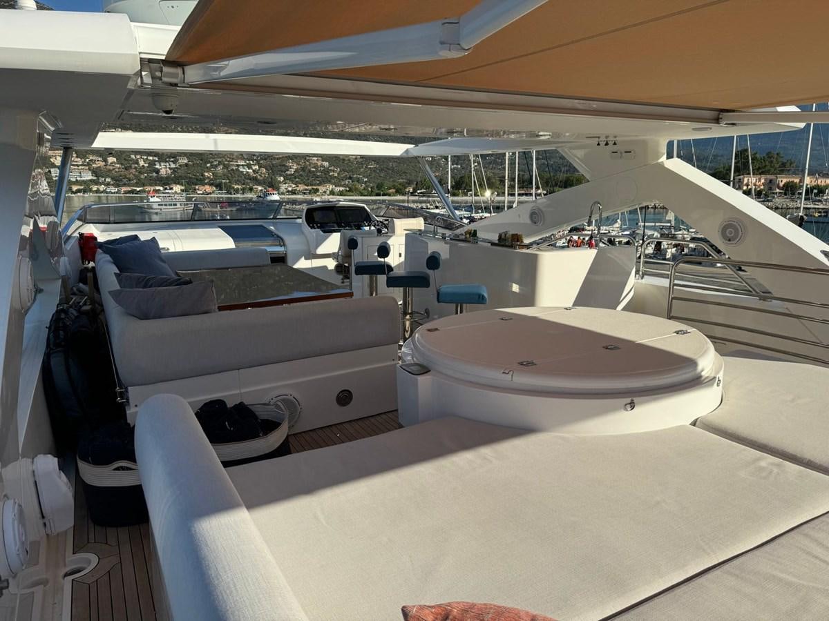a boat with a deck and a deck and a pool aboard SOLARIS Yacht for Sale