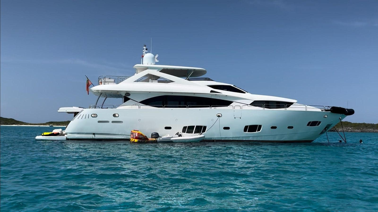 a white yacht in the water aboard SOLARIS Yacht for Sale