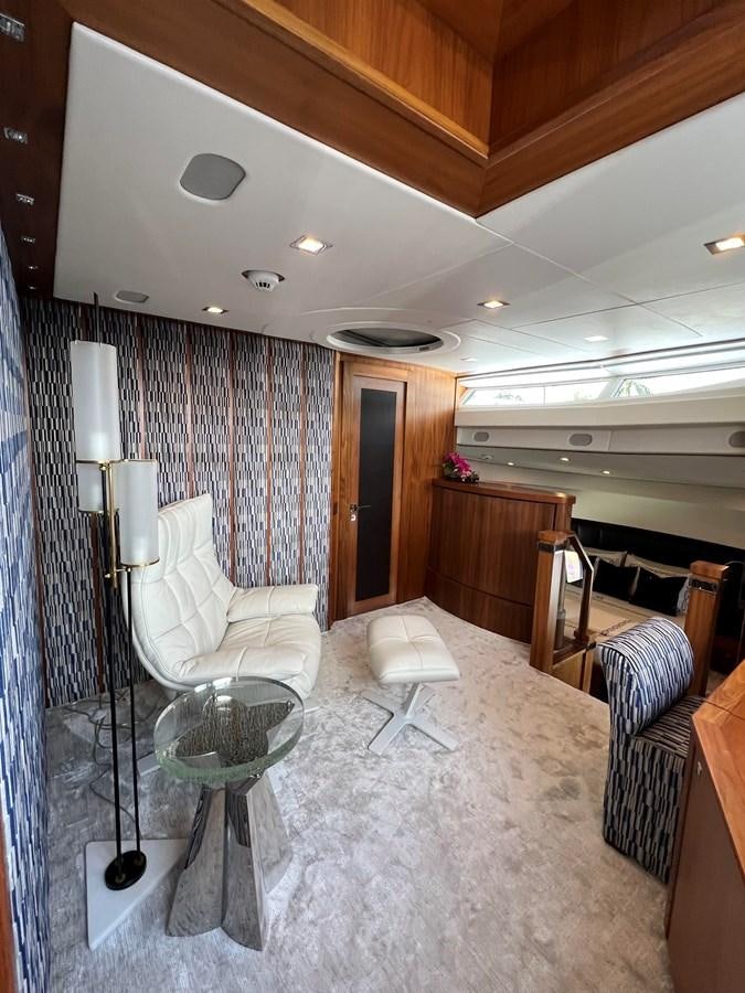 a room with a table and chairs aboard SOLARIS Yacht for Sale