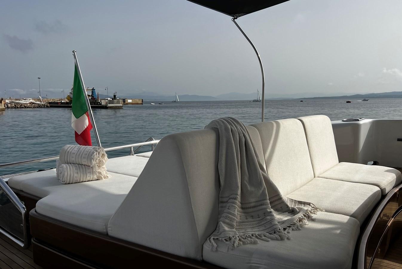 a boat with a flag on it aboard SCORPIO Yacht for Sale