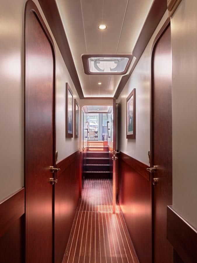 a hallway with doors aboard KAFTAN Yacht for Sale