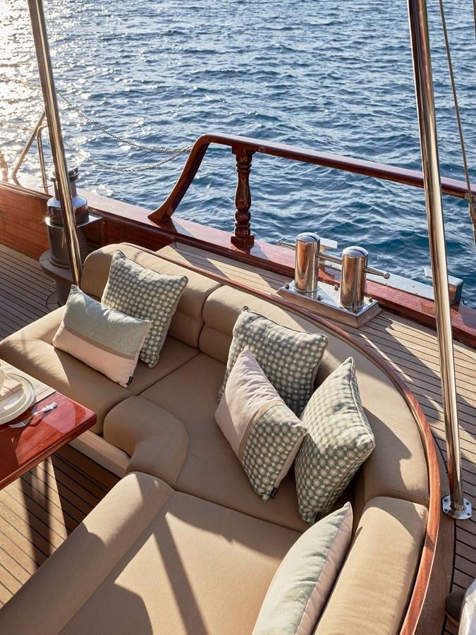 a boat with pillows on a body of water aboard KAFTAN Yacht for Sale