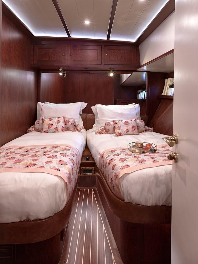 a couple of beds in a room aboard KAFTAN Yacht for Sale