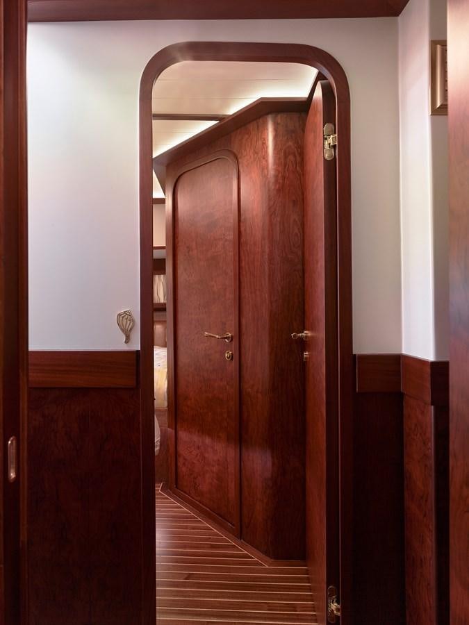 a wooden door in a room aboard KAFTAN Yacht for Sale