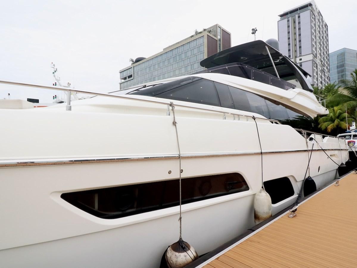 a white boat with a black roof aboard SONIA Yacht for Sale