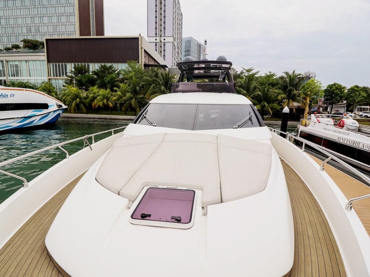 a boat in a harbor aboard SONIA Yacht for Sale