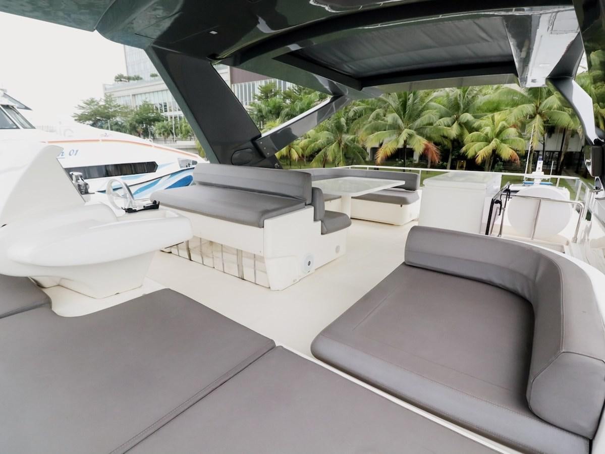 a white car garage aboard SONIA Yacht for Sale