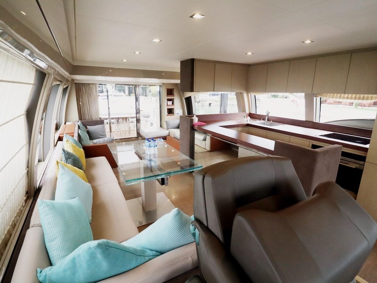 a room with couches and a table aboard SONIA Yacht for Sale
