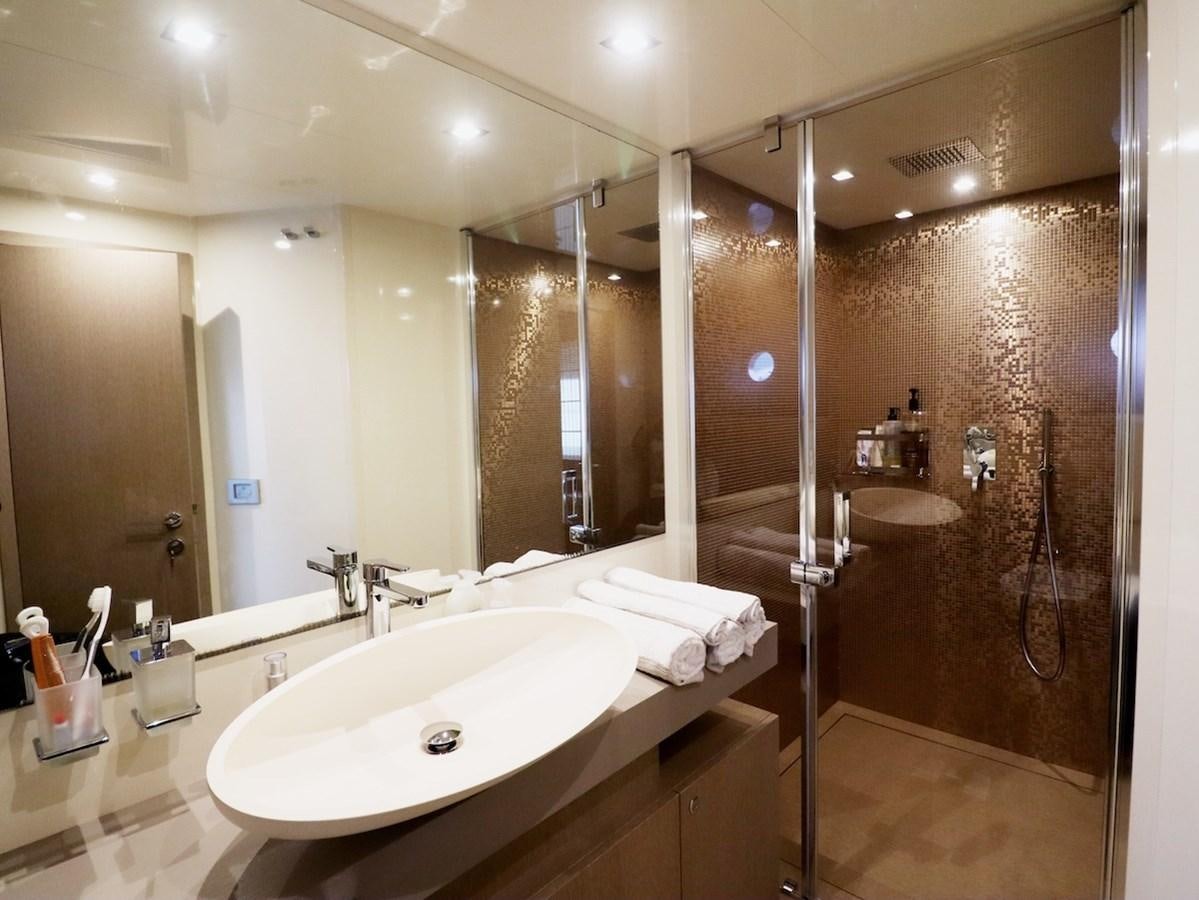a bathroom with a large mirror aboard SONIA Yacht for Sale