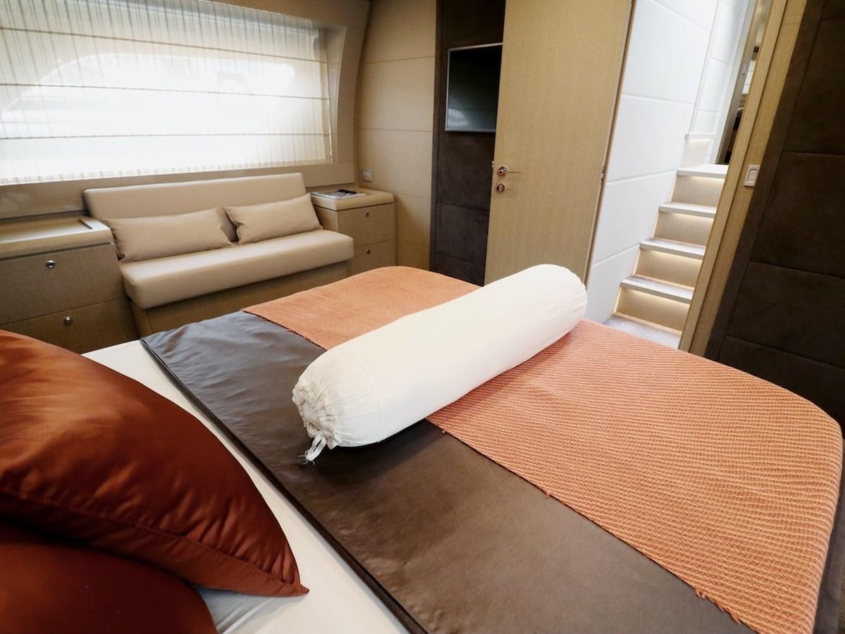 a bed in a room aboard SONIA Yacht for Sale