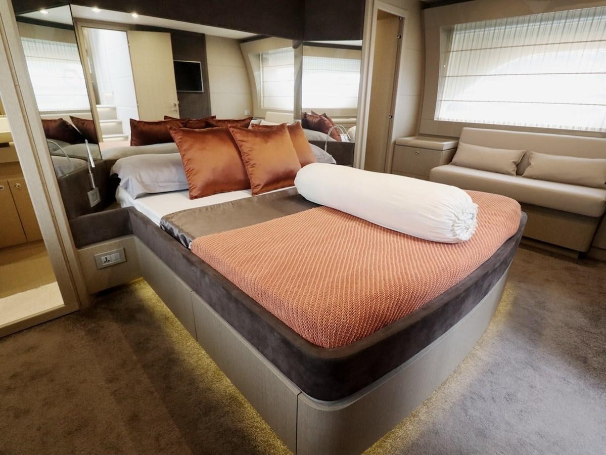 a bed in a room aboard SONIA Yacht for Sale