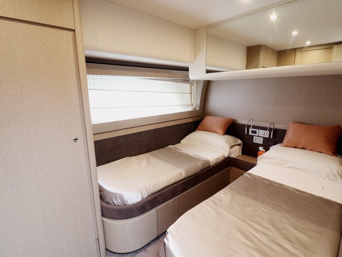 a couple of beds in a room aboard SONIA Yacht for Sale