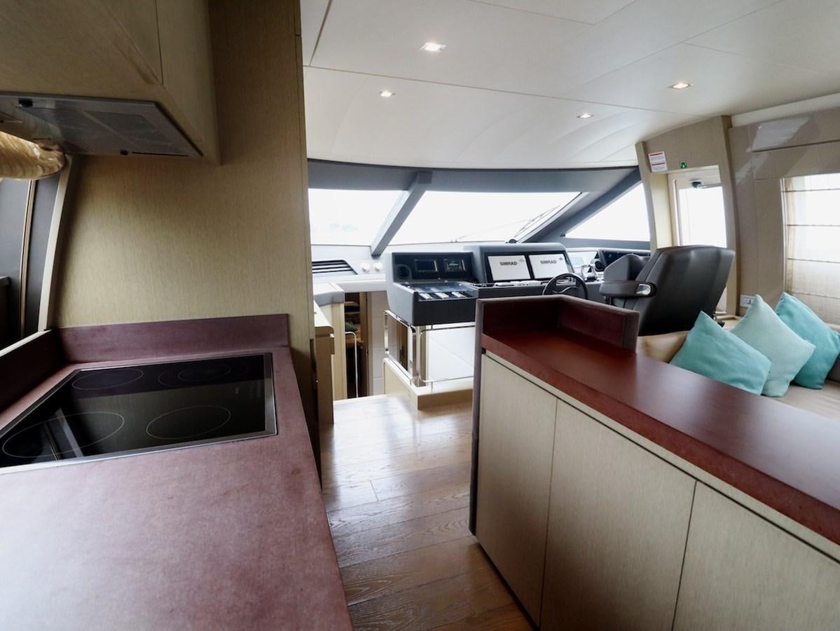 a kitchen with a large island aboard SONIA Yacht for Sale