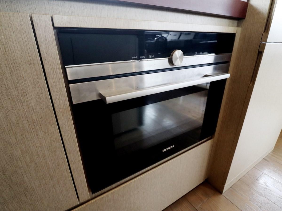 a microwave oven in a kitchen aboard SONIA Yacht for Sale