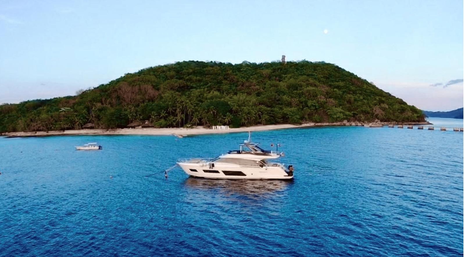 a boat on the water aboard 2020 FERRETTI 670 Yacht for Sale