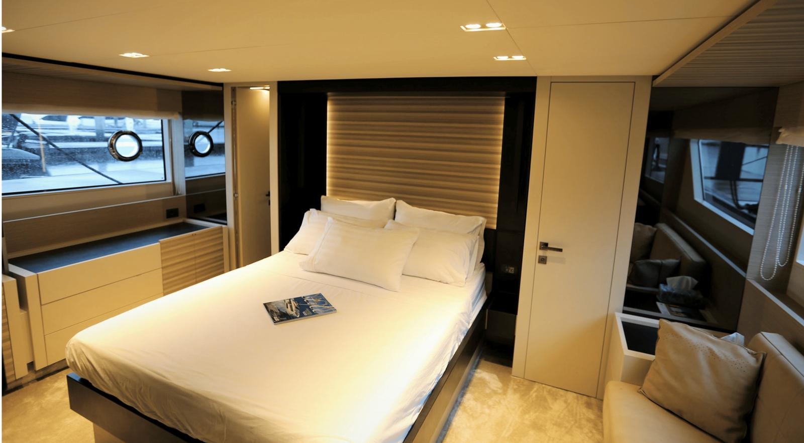 a hotel room with a bed aboard 2020 FERRETTI 670 Yacht for Sale
