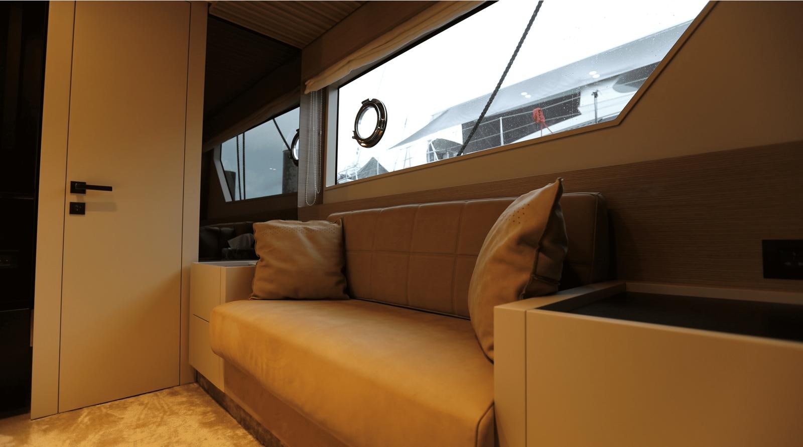 a couch in a room aboard 2020 FERRETTI 670 Yacht for Sale