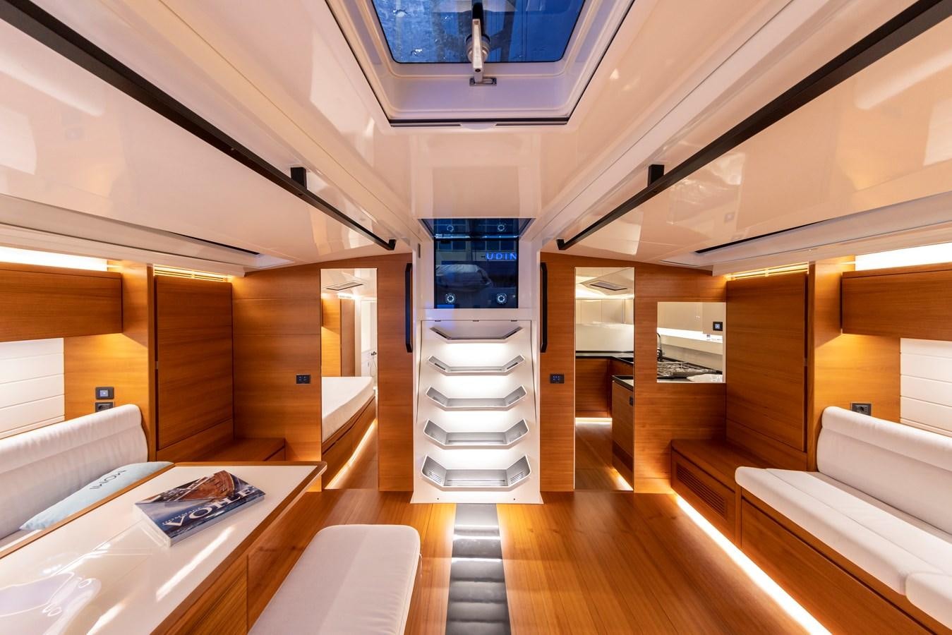 a room with a large staircase aboard MOMI Yacht for Sale