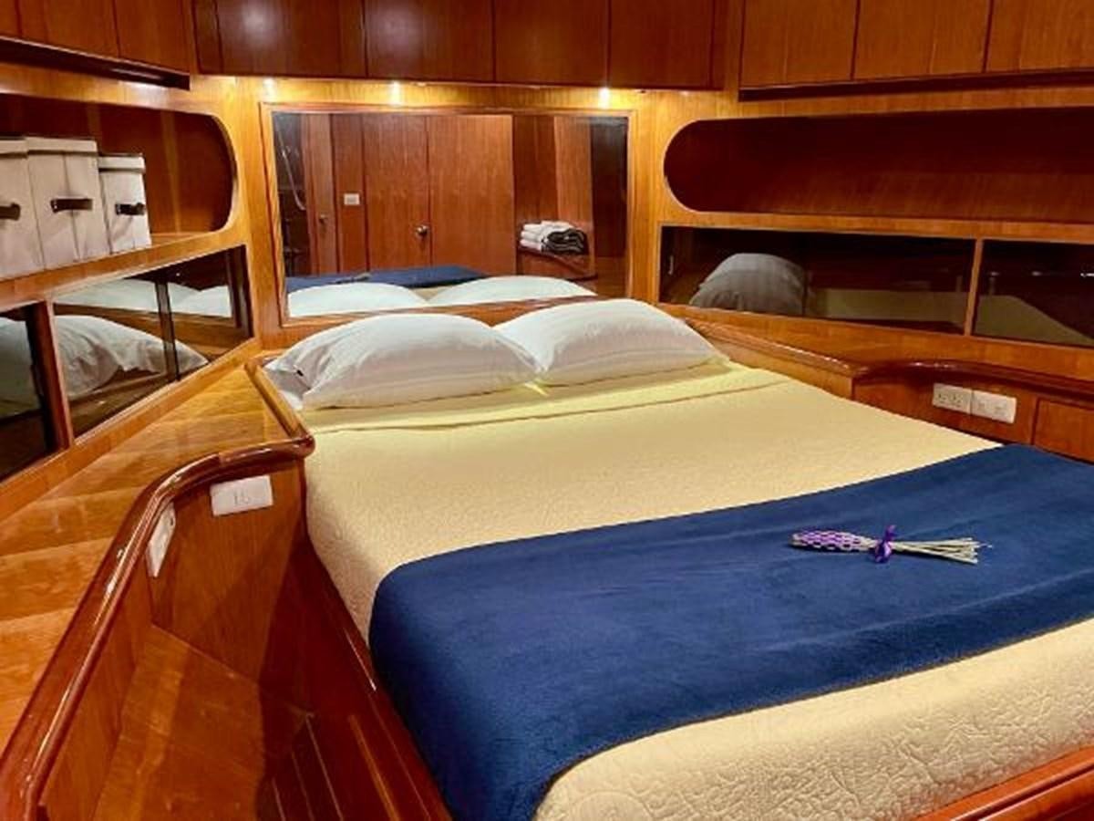 a room with bunk beds aboard SOTITO Yacht for Sale