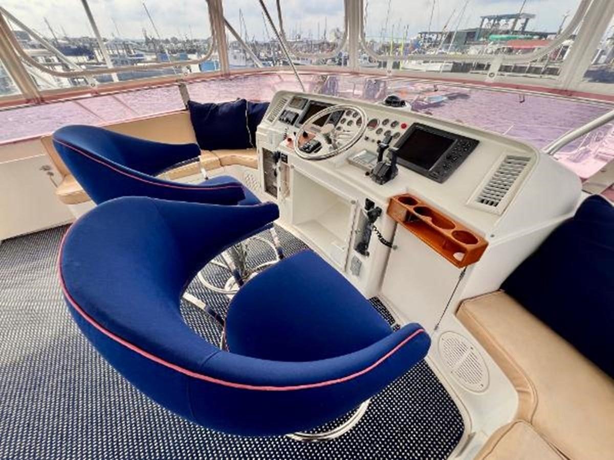 a white and blue car aboard SOTITO Yacht for Sale