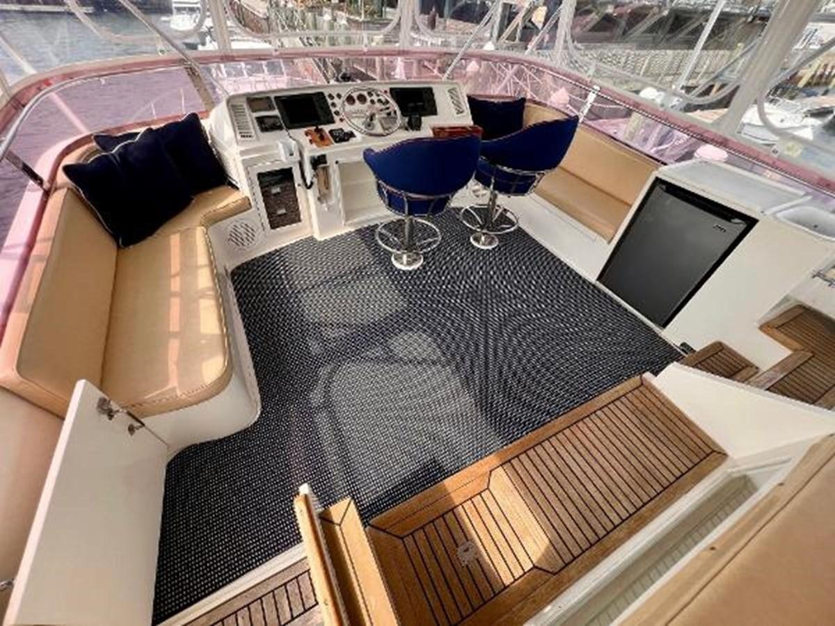 a group of wine glasses on a table aboard SOTITO Yacht for Sale