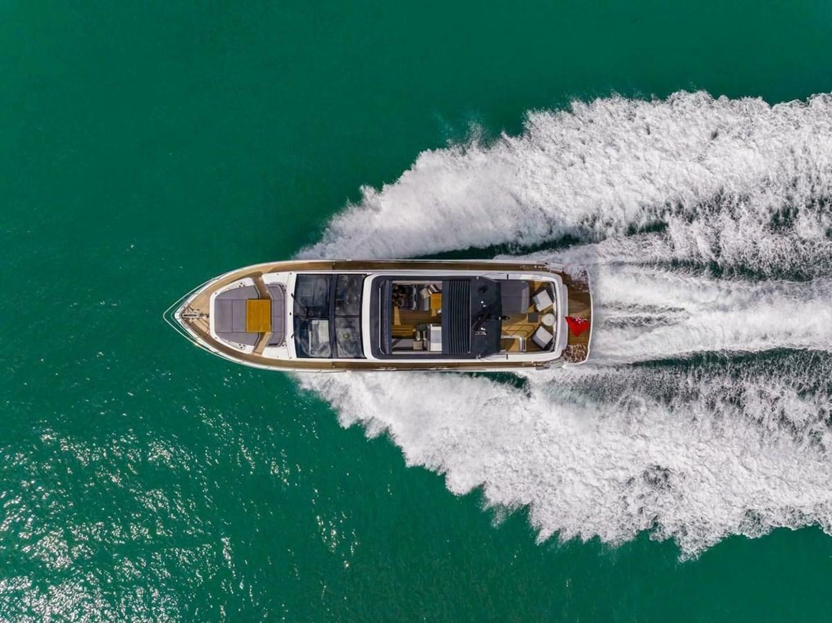 a helicopter flying over a sea aboard PEARL 72 INDULGENCE Yacht for Sale