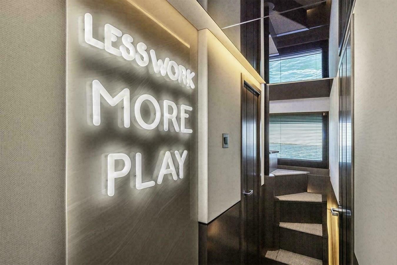 a hallway with a sign on the wall aboard PEARL 72 INDULGENCE Yacht for Sale