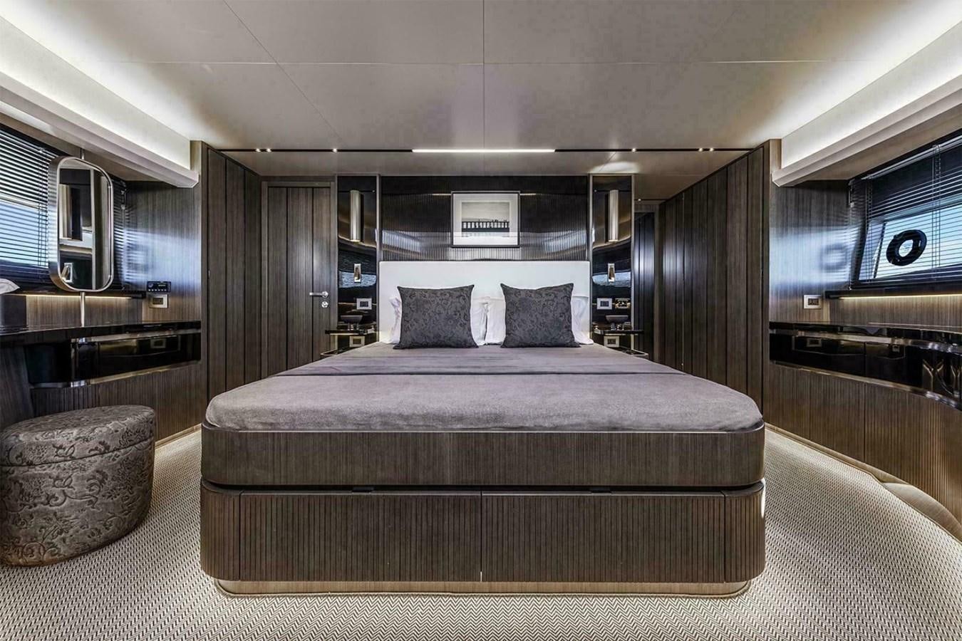a large bed in a room aboard PEARL 72 INDULGENCE Yacht for Sale