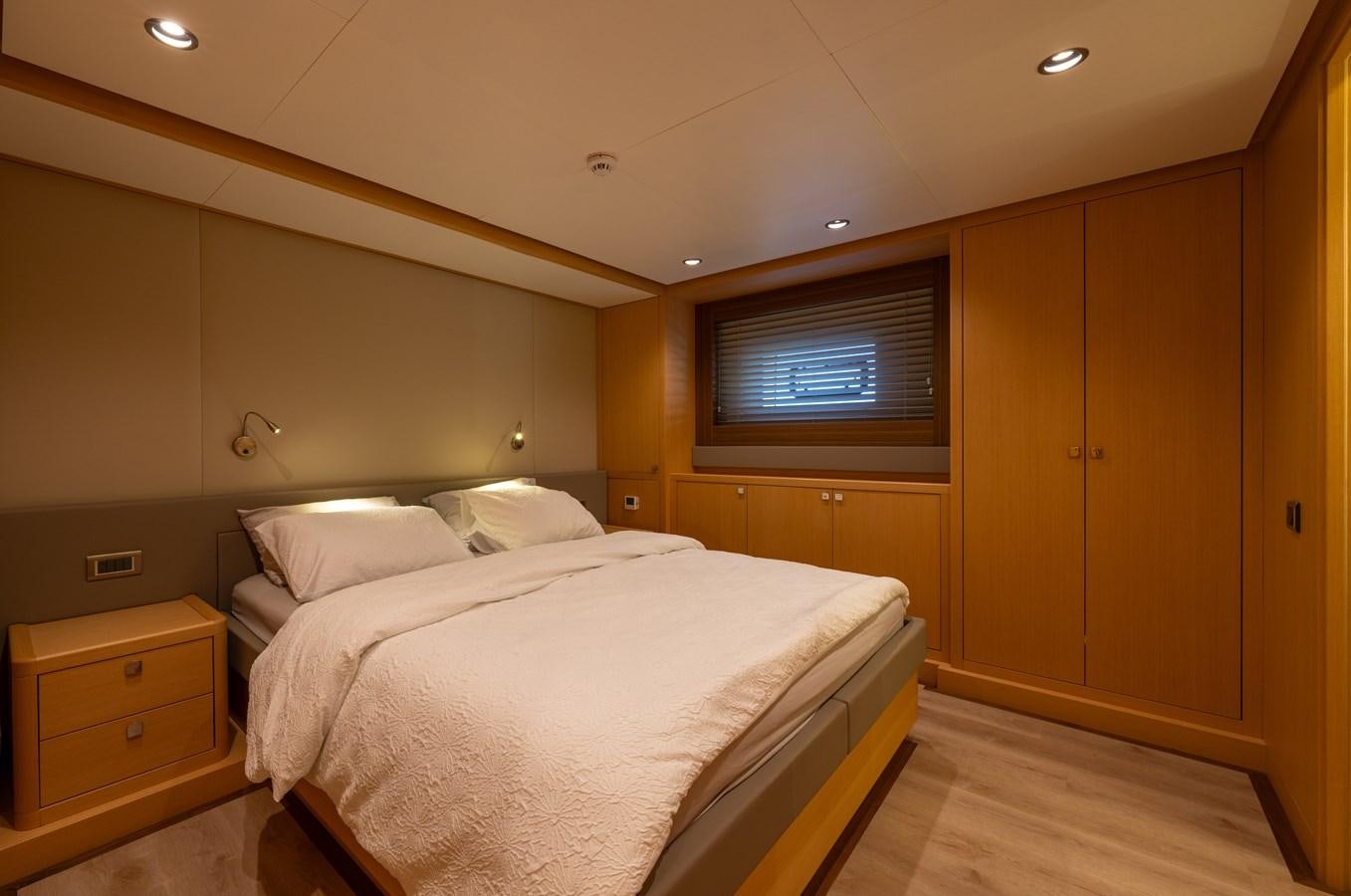 a couple of beds in a room aboard JASMINA III Yacht for Sale